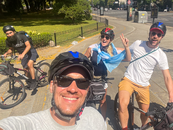 Julian from Biker Street at a bike tour stop with some guests at bosques de palermo