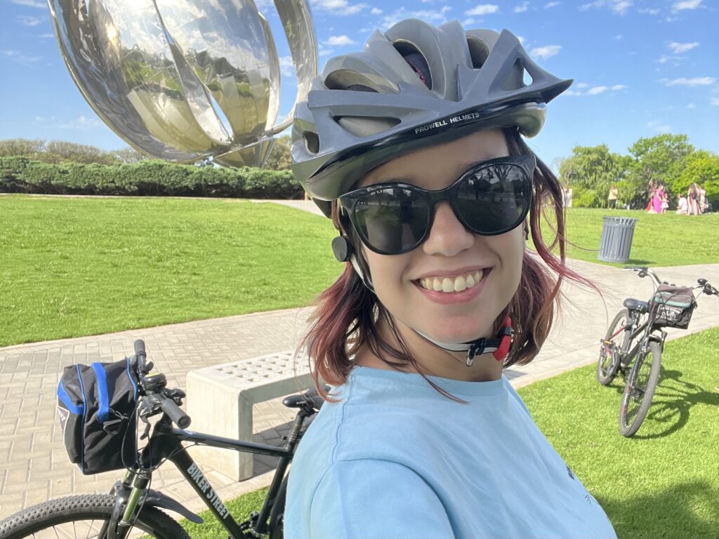 Gilda is smiling while she is doing a city tour in buenos aires