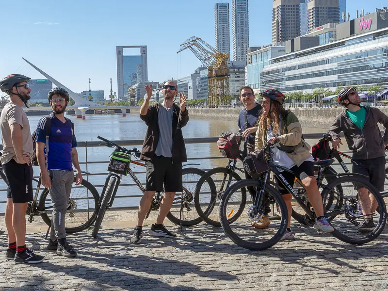 Bike tour host in Puerto Madero talking about the area