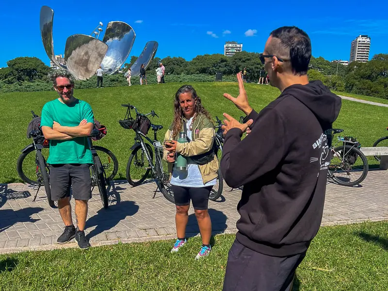 talking about floralis generica in a bike tour