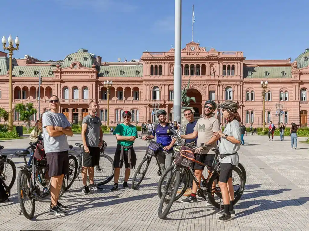 freindly people in a bike tour talking about economic situation in buenos aires argentina