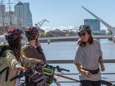 bike tour in puerto madero with a local guide talking about puente de la mujer